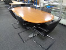 An oval twin pedestal boardroom table in a walnut finish, length 220cm, width 100cm,
