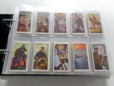 An album containing a large quantity of Wills cigarette cards, Grande cards,