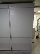 A Flexiform metal office stationary cabinet with roller shutter door, width 100 cm,