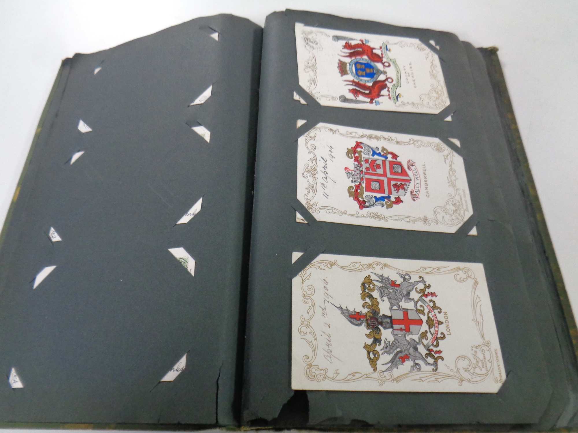 An antiquarian postcard album containing a large quantity of colour and monochrome postcards, - Image 2 of 3