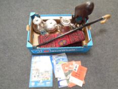 A box containing Persian hearth rug, 1950/60s football programmes, a walking stick parasol,