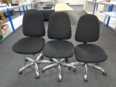 Three swivel adjustable typist's chairs