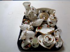 A tray containing sixteen pieces of Royal Albert Old Country Roses cabinet china to include
