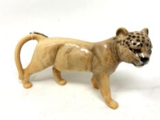 A Beswick china figure : Lion Cub (Facing Right), model 1508, golden brown, gloss, height 10 cm.