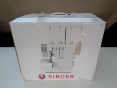 A Singer 14SH754 thread overlock sewing machine in box