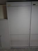 A Flexiform metal office stationary cabinet with roller shutter door, width 100 cm,