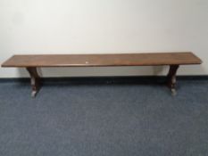 A 20th century pitch pine bench,