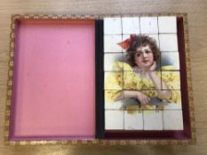 An Edwardian twenty four-piece chromolithographic cubic jigsaw puzzle,