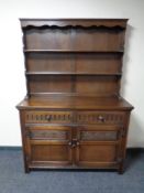 A welsh dresser fitted double door cupboard and two drawers beneath, height 174 cm,
