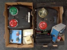 Two boxes containing a traffic light system with control box and switches from Harlequin's Football