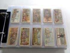 An album containing a large quantity of cigarette cards to include Wills,