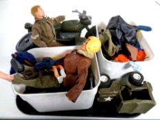 A tray containing 20th century Action Man figures, vehicles, accessories and clothes,