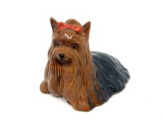 A Beswick china figure : Yorkshire Terrier (Lying), 1944, grey and tan, gloss, height 9 cm.
