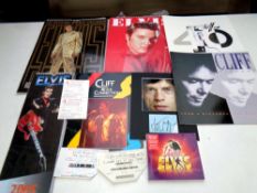 A tray containing memorabilia to include Mick Jagger autograph with accompanying photograph,