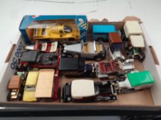 A box containing a small quantity of die cast vehicles to include Lledo, Corgi,