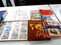 A box containing a large quantity of 20th and 21st century stamps of the world,