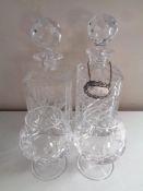 Two lead crystal cut glass decanters, one with gin label,