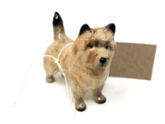 A Beswick china figure : Cairn Terrier, model 2112, dark cream, gloss, height 7 cm.