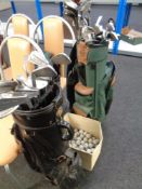 Two golf bags of irons, drivers and putters by Dunlop, Daiwa,