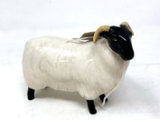 A Beswick china figure : Black-Faced Sheep, model 1765, black and white, gloss, height 8 cm.