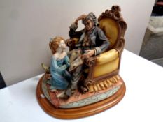 A Capodimonte figure, Story Teller by Germano Cortese (as found),