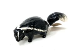 A Beswick china figure : Skunk, model 1308, black and white, gloss, height 7 cm.