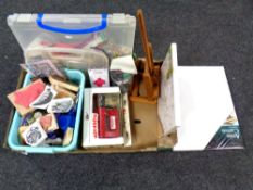 A box containing a quantity of crafting items to include canvases, desk top easel,