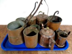 A tray containing antique and later copper wares to include cider and milk jugs, copper teapot,