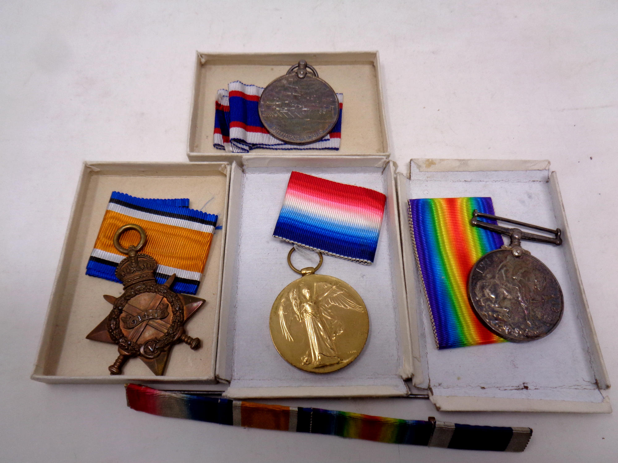 A set of four World War I medals comprising 1914-15 Star, Victory Medal,