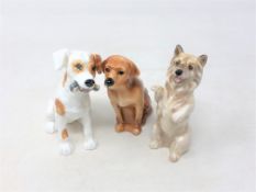 Three small Royal Doulton figures, Jack Russell with slipper,