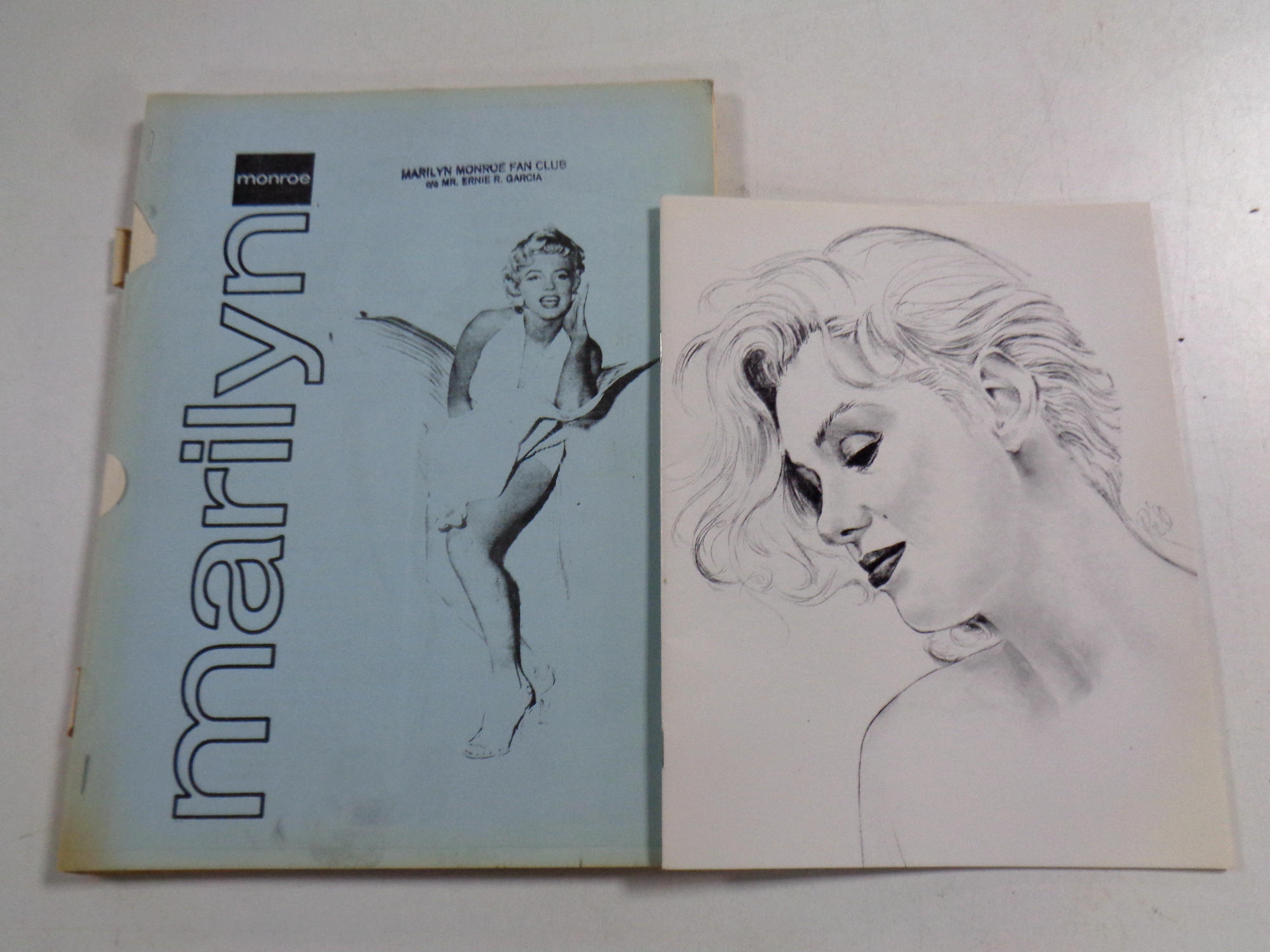 A Marilyn Monroe 1970s fan club released book along with a 1992 memorial service programme handed