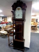 A George III mahogany eight day longcase clock with painted moon phase dial signed George Monks,