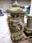 A concrete garden figure,