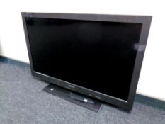 A Toshiba 40'' LCD TV with remote