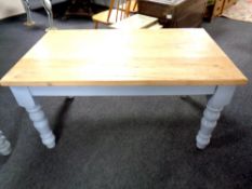 A pine topped coffee table on painted base,