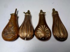 Four copper and brass shot flasks