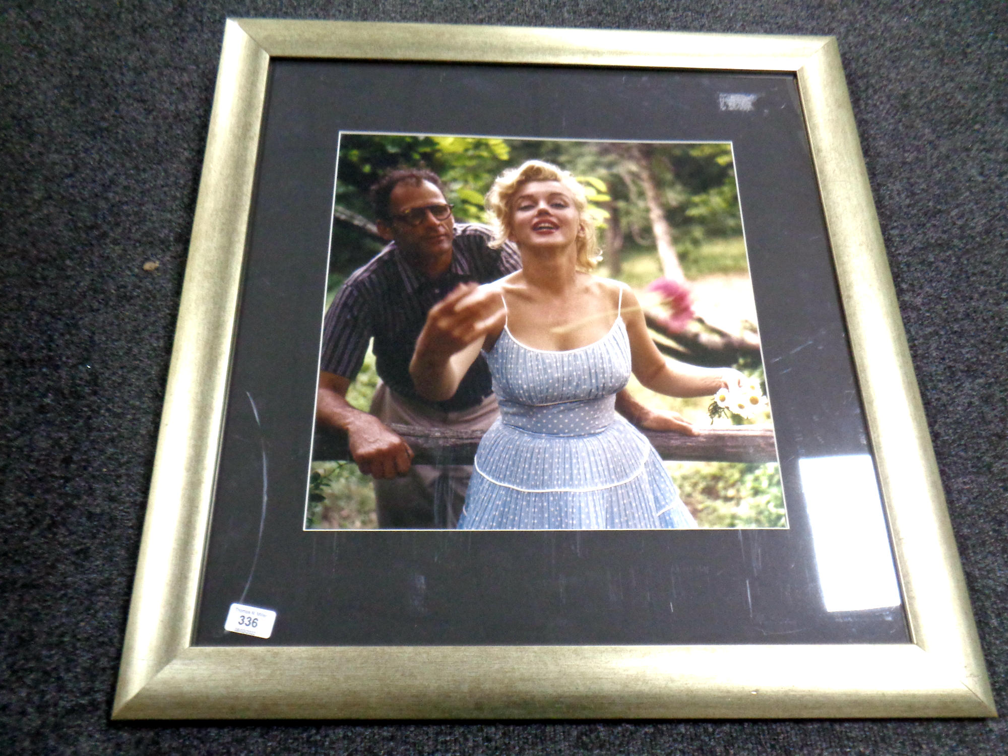 Photographer: Sam Shaw - Photo of Marilyn Monroe and Arthur Miller in the gardens of their Roxbury