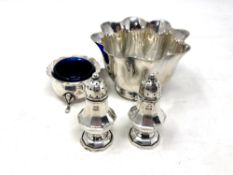 A silver salt, Birmingham marks, together with a pair of silver casters and a plated sugar bowl.