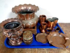 A tray containing antique and later copper wares to include Art Deco planter, lidded pot, measures,
