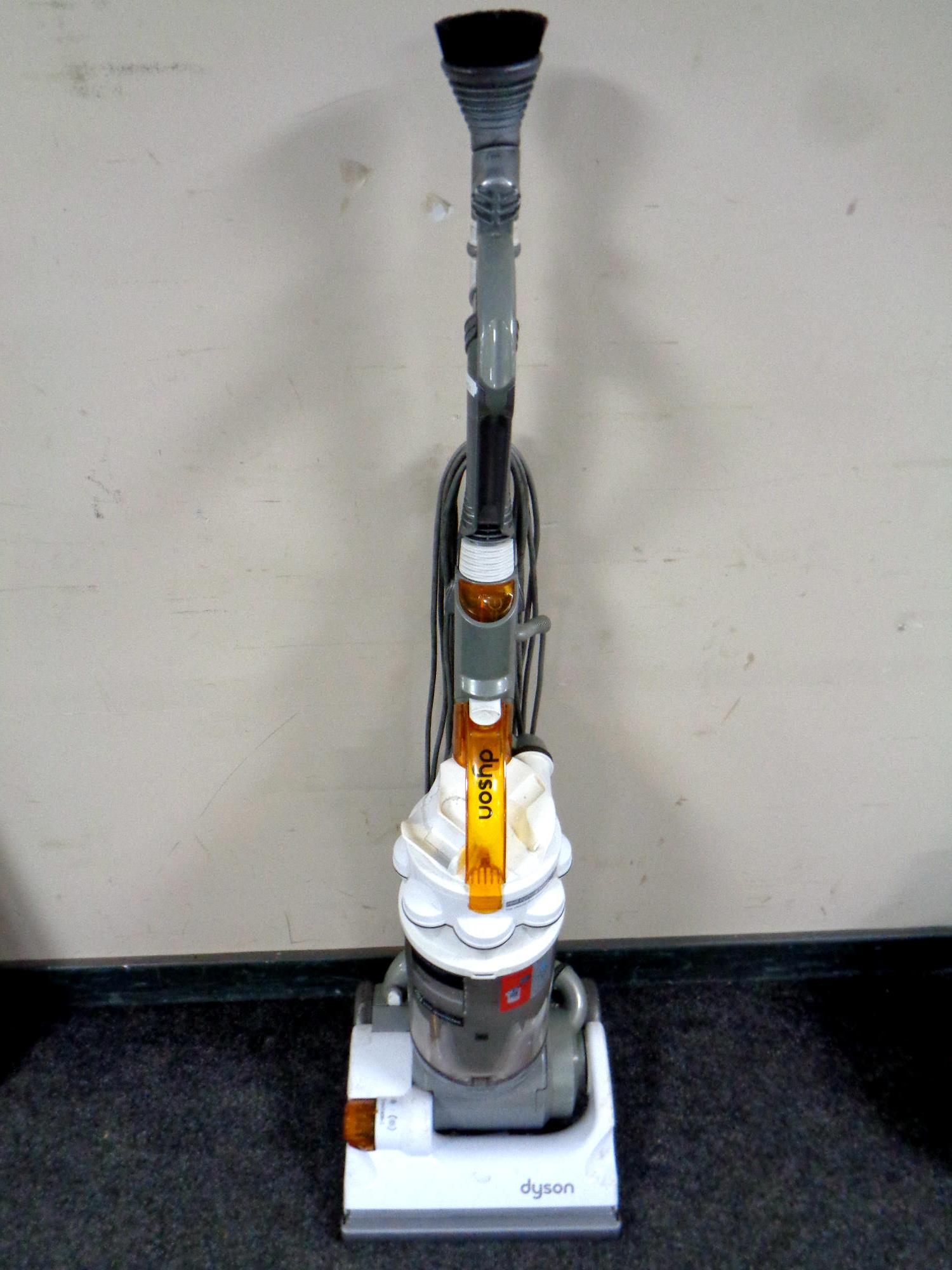 A Dyson DC 14 upright vacuum