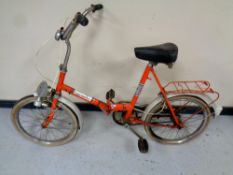 A vintage lady's Universal folding bike
