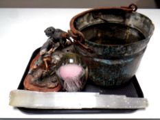 A tray containing 19th century copper cast iron handled bucket, a glass jellyfish paperweight,