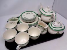 A tray containing twenty pieces of Copeland Spode Christmas tree tea china together with a matching