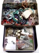 A tray containing a large quantity of costume jewellery including beaded necklaces,
