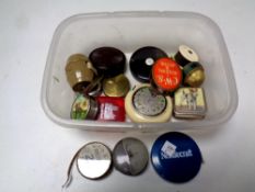 A box containing vintage 20th century haberdashery tape measures,