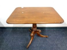 A Victorian mahogany tilt topped pedestal occasional table