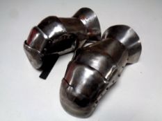 A pair of iron gauntlets