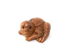 A Chinese carved hardwood netsuke - giant turtle