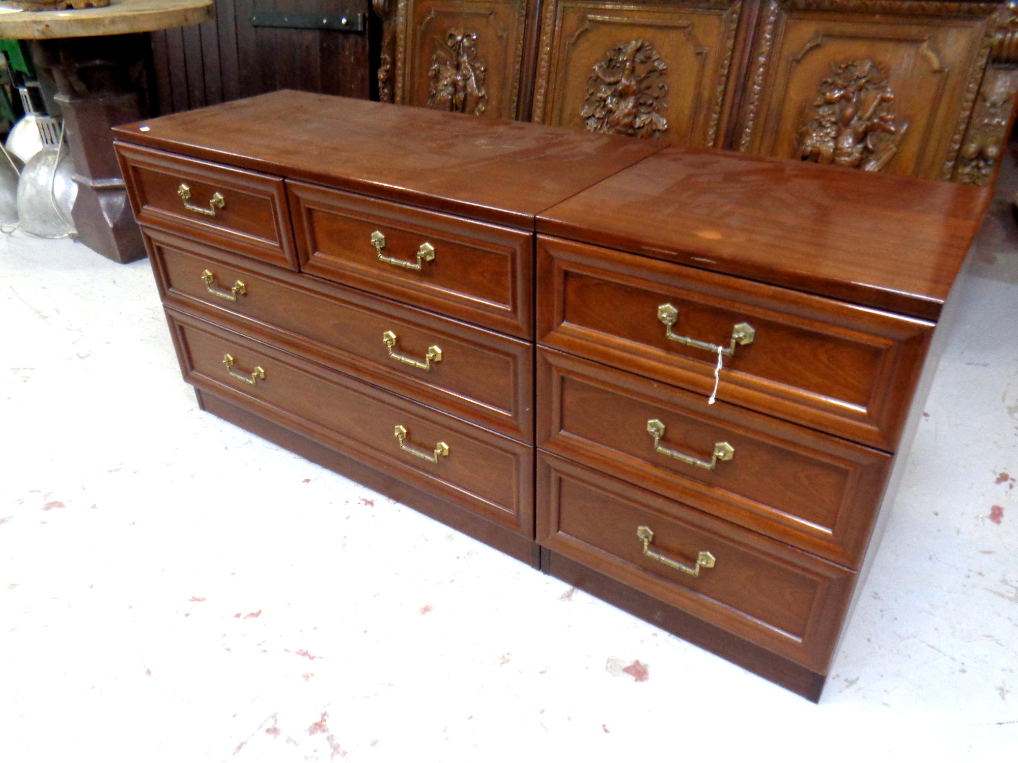 A 20th century G Plan four drawer chest together with three drawer bedside chest in a mahogany