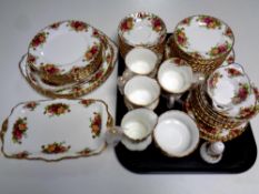 Approximately sixty-seven pieces of Royal Albert Old Country Roses tea and dinner china